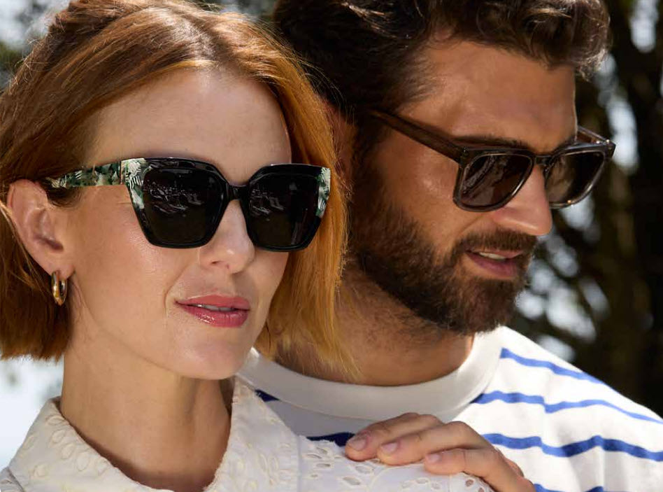 Man and woman wearing sunglasses